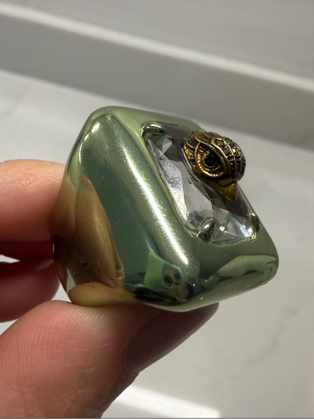 Kurt Geiger Green Metallic Statement Ring with Clear Gem and Gold Accent - Picture 5 of 6
